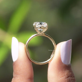 Back View of Cushion Cut Moissanite Ring In two fingers