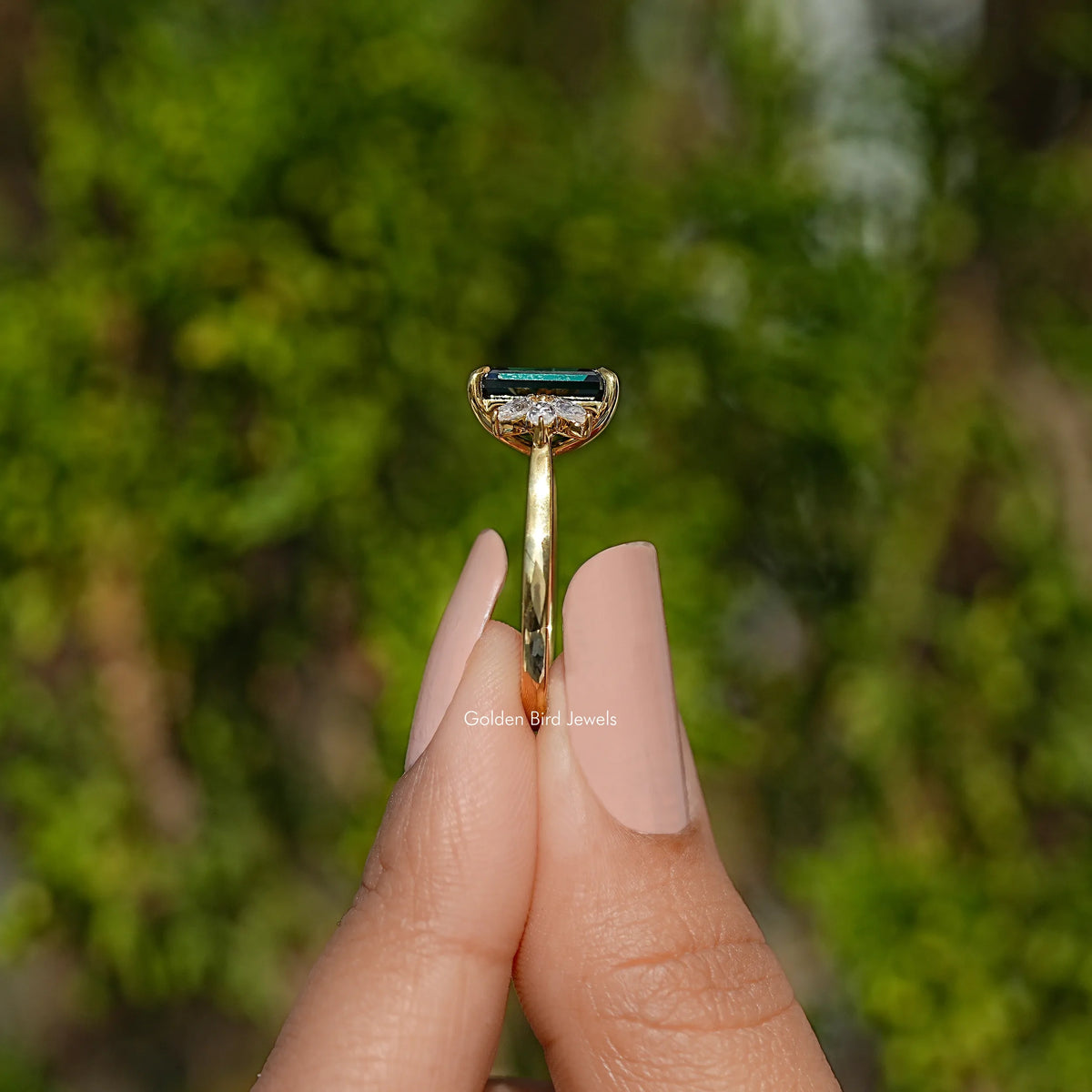Dark Green Emerald And Marquise Cut Engagement Ring