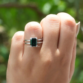 Front View of Dark Green Emerald Cut Solitaire Ring In White Gold