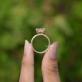Back view of East West Criss Cut Moissanite ring in secure setting 