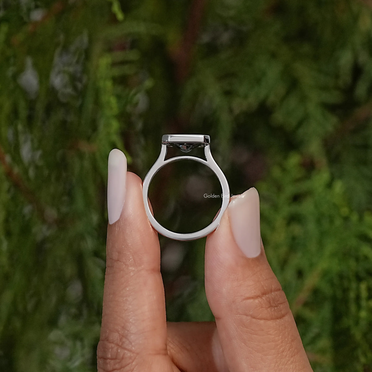 Back view of silver solitaire ring with square gray moissanite center stone