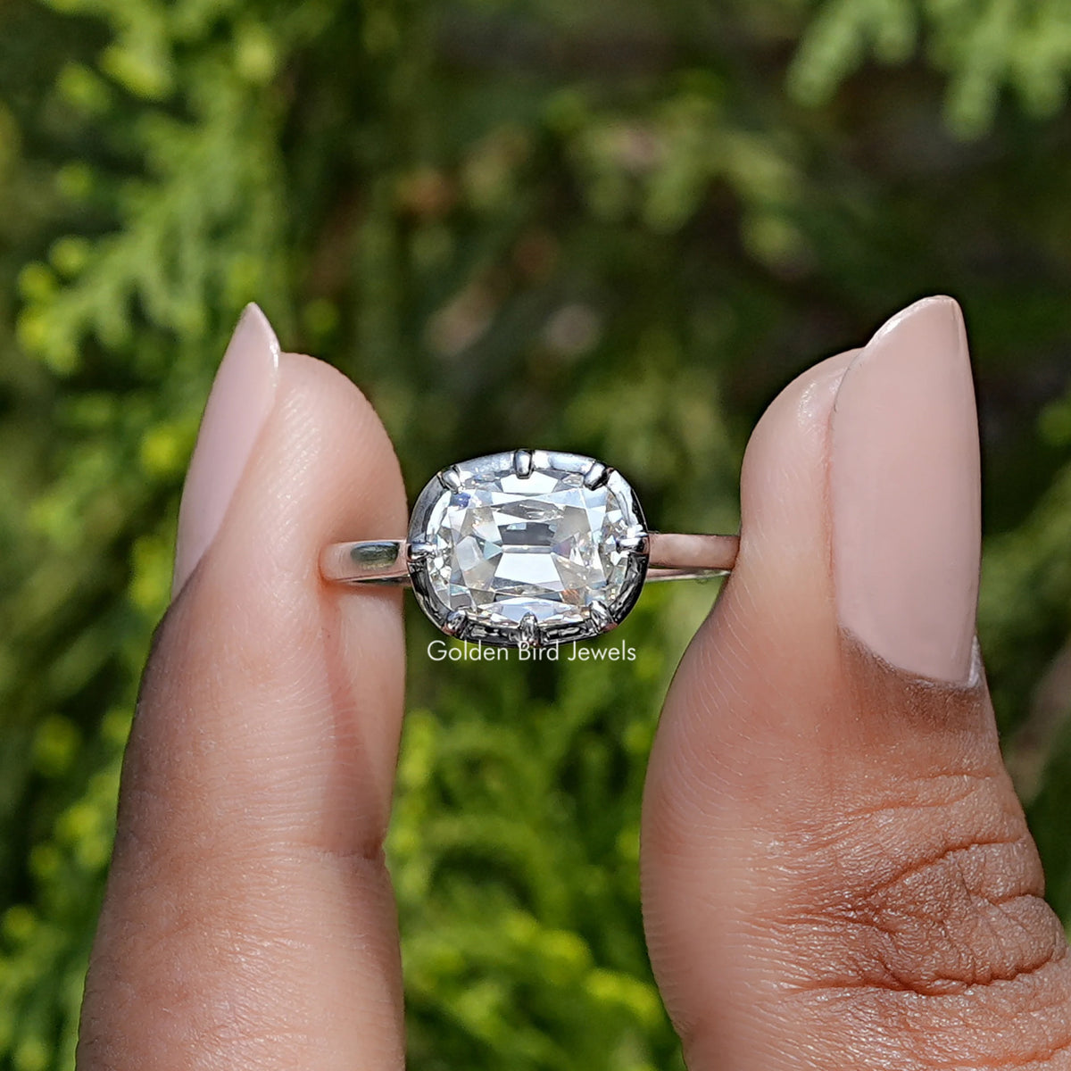 View of east west cushion cut moissanite Wedding  Ring