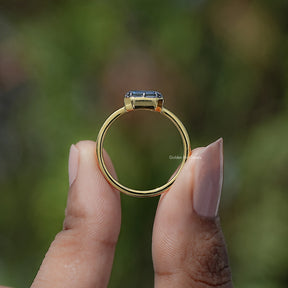 Back view of East West Cut Moissanite Solitaire Ring in secure setting 