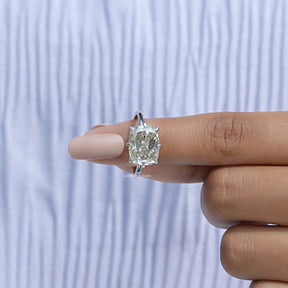 In finger front View of East West Old Mine Cushion Moissanite Ring In White Gold