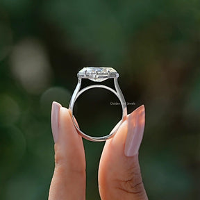 Back View of Moval Cut Moissanite Solitaire Ring In two fingers
