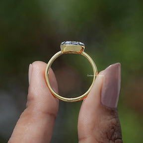 Back view of East West Oval Cut Moissanite Solitaire Ring in secure setting 