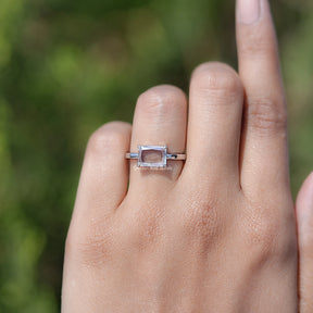 In finger view of Portrait Radiant Cut Solitaire East West Ring