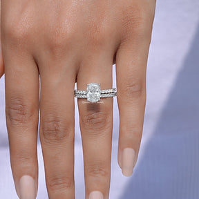 View Of A Cushion Cut Diamond Ring With Round Cut Wedding Band