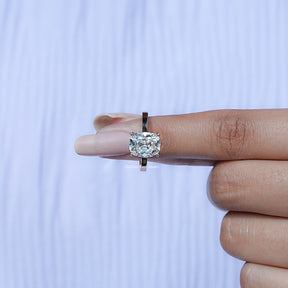 In finger front View of Old Mine Cushion Cut Hidden Halo Ring In Yellow Gold