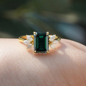 View of Emerald Cut Moissanite Ring In Yellow Gold