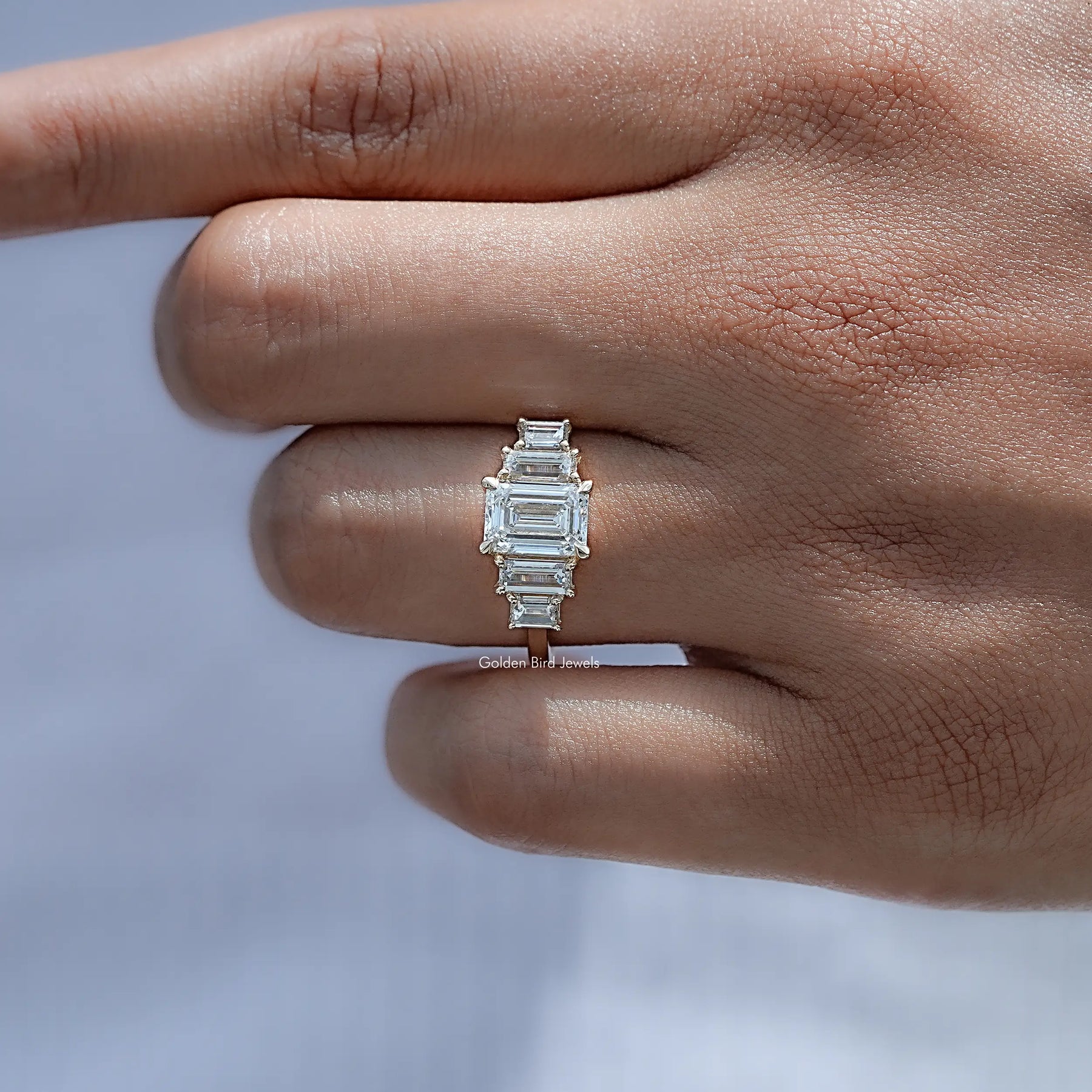 Detailed view of Emerald And Baguette Diamond Five Stone Ring