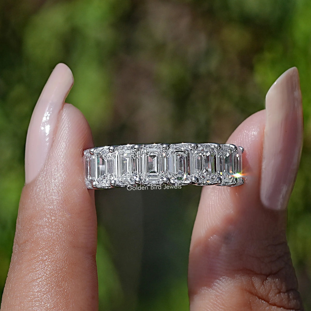 Front View of Emerald Cut Lab Diamond Eternity Band In two Fingers