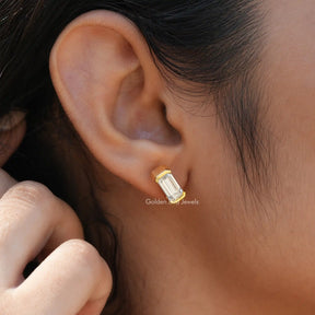 Close  view of emerald cut stud earrings