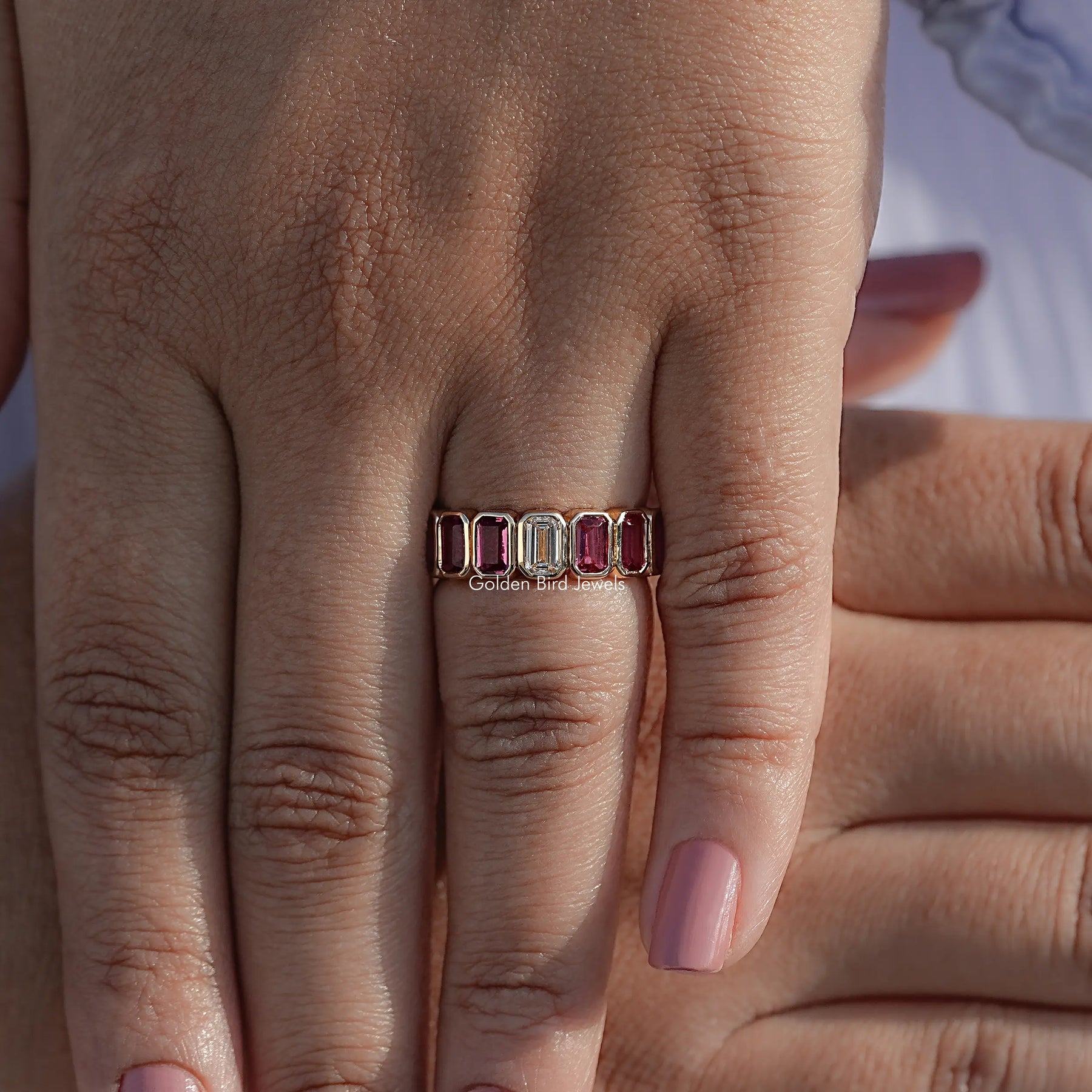 Bezel Set Emerald Gemstone Eternity Band