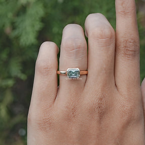 In finger front view of Moissanite Engagement Ring in Radiant Cut Stone