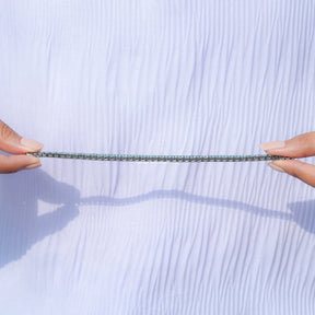 Detailed View Of Blue Round Cut Moissanite Tennis Bracelet
