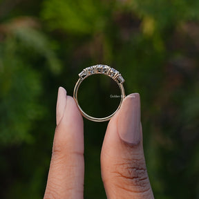 Back View of Round Cut Lab Diamond Five Stone Ring In two fingers