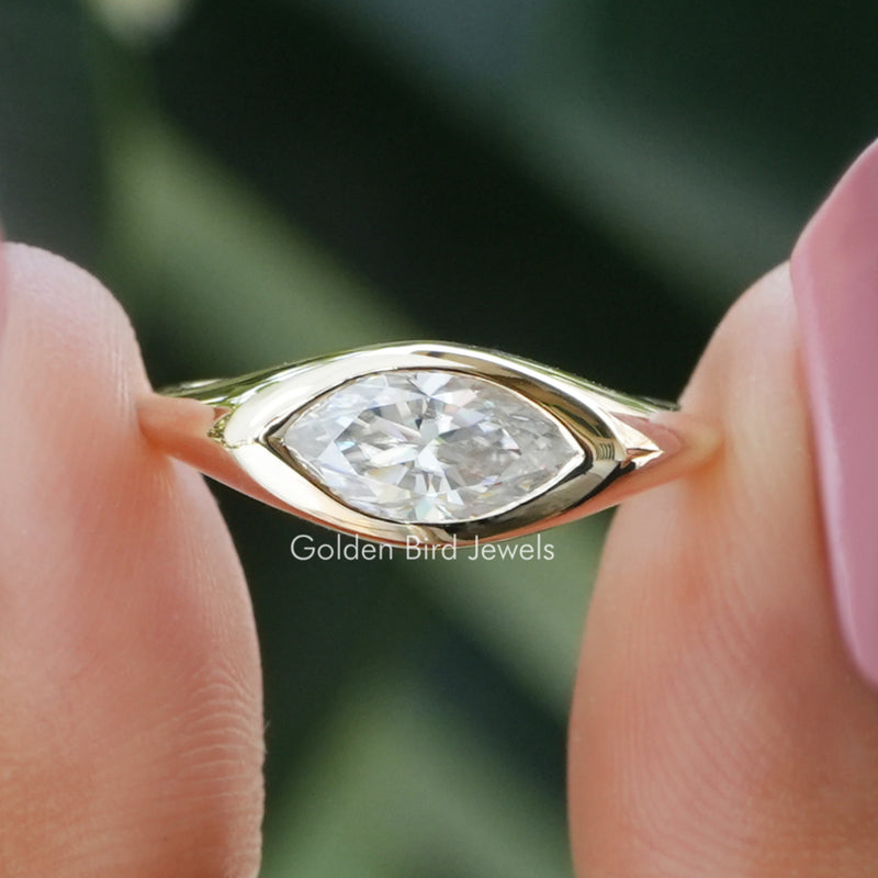 East West Marquise Cut Bezel Set Moissanite Ring