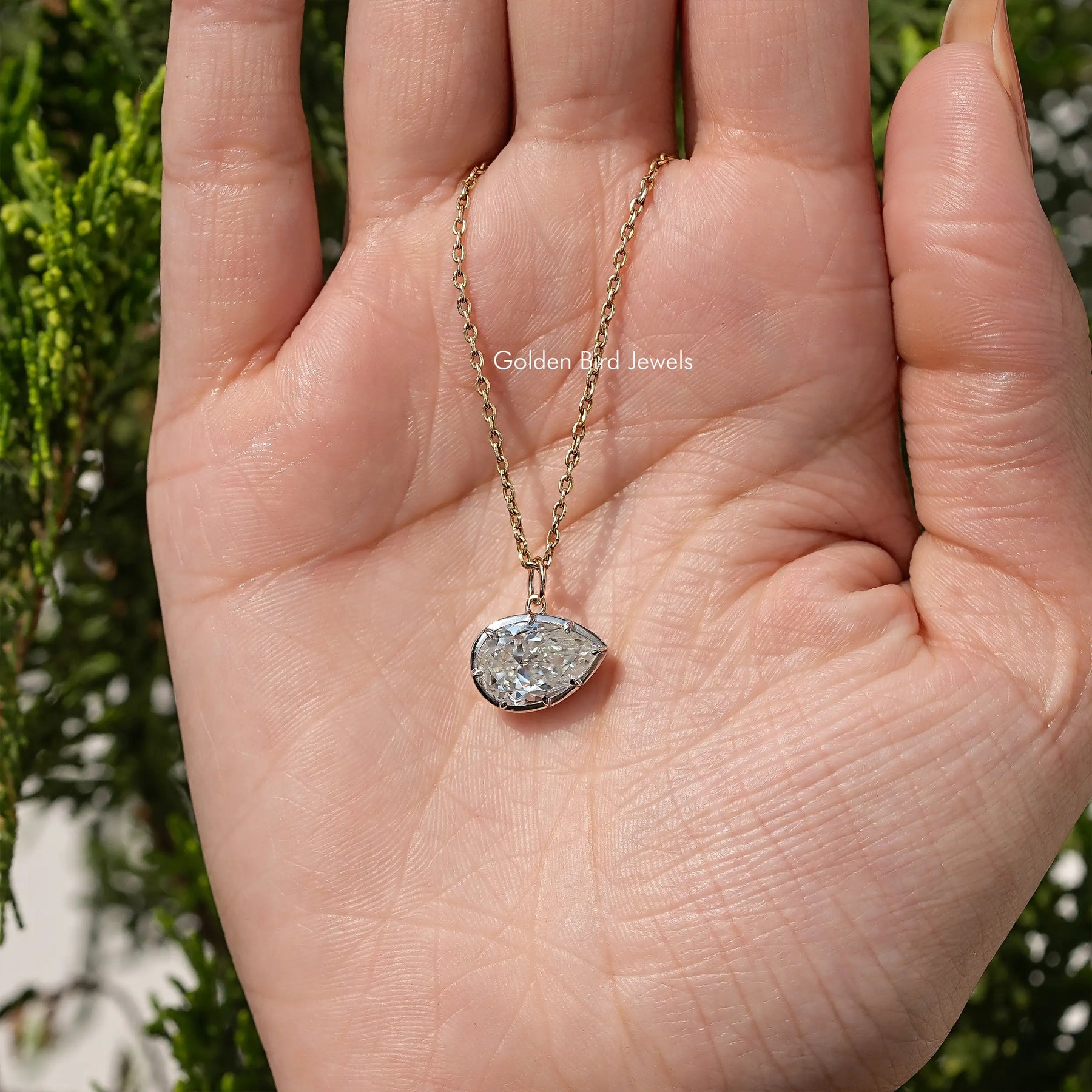 Moissanite Pear Shaped Bezel Solitaire Pendant