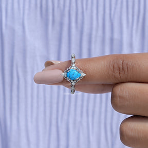 In finger front View of Pear Cut Diamond Accent Ring In White Gold
