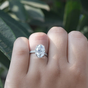 View of Oval Cut Hidden Halo Engagement Ring In White Gold