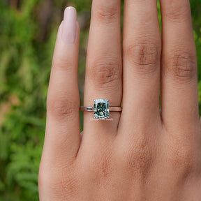 View of Fancy Green Elongated cushion moissanite hidden halo ring 
