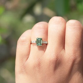 Detailed View Of Emerald And Tapper Baguette Cut Moissanite Ring In Yellow Gold