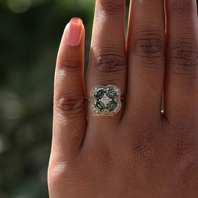 View of Green Oval Cut Moissanite Engagement Ring In Yellow Gold