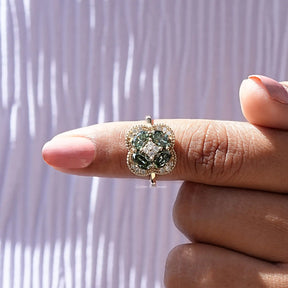 In finger front View of Green Oval Cut Moissanite Engagement Ring