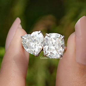 Front View of Heart and Cushion Cut Moissanite Toi Et Moi Ring In two Fingers
