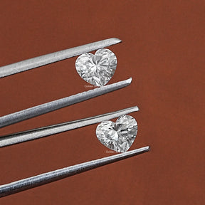 In Tweezer View Of Lab Diamond Heart Shaped Matching Pair
