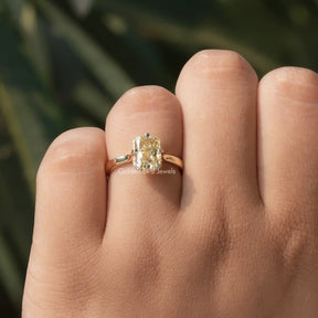  finger view of yellow moissanite  engagement ring 