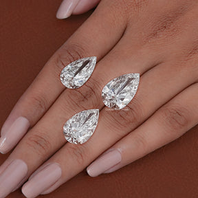 In hand Showing View Of Pear Cut Lab Diamond 