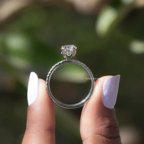 Back View Old Mine Cushion And Round Cut Ring In two fingers