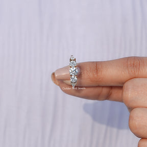 In finger front view of Kite And Round Cut Lab Diamond 5 Stone Ring