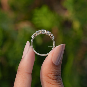 Back View of Round Cut Lab Grown Diamond Five Stone Ring In two fingers