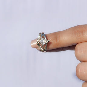 In finger front View of Kite Cut Lab Grown Diamond Bridal Ring In Yellow Gold