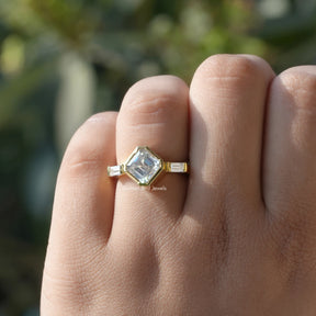View of Asscher Cut Diamond three stone Engagement Ring In Yellow Gold
