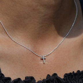 Close-Up View of Round Cut Diamond Cross Pendant In White Gold