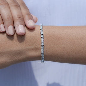 In hand Showing View of Princess Cut Diamond Tennis Steel Bracelet

