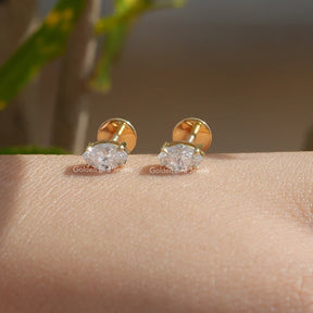 In Hand View Of Lab grown diamond marquise cut stud earrings
