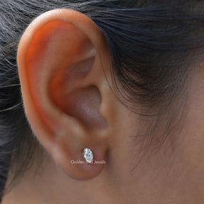 This moissanite earrings crafted with yellow gold and prong setting