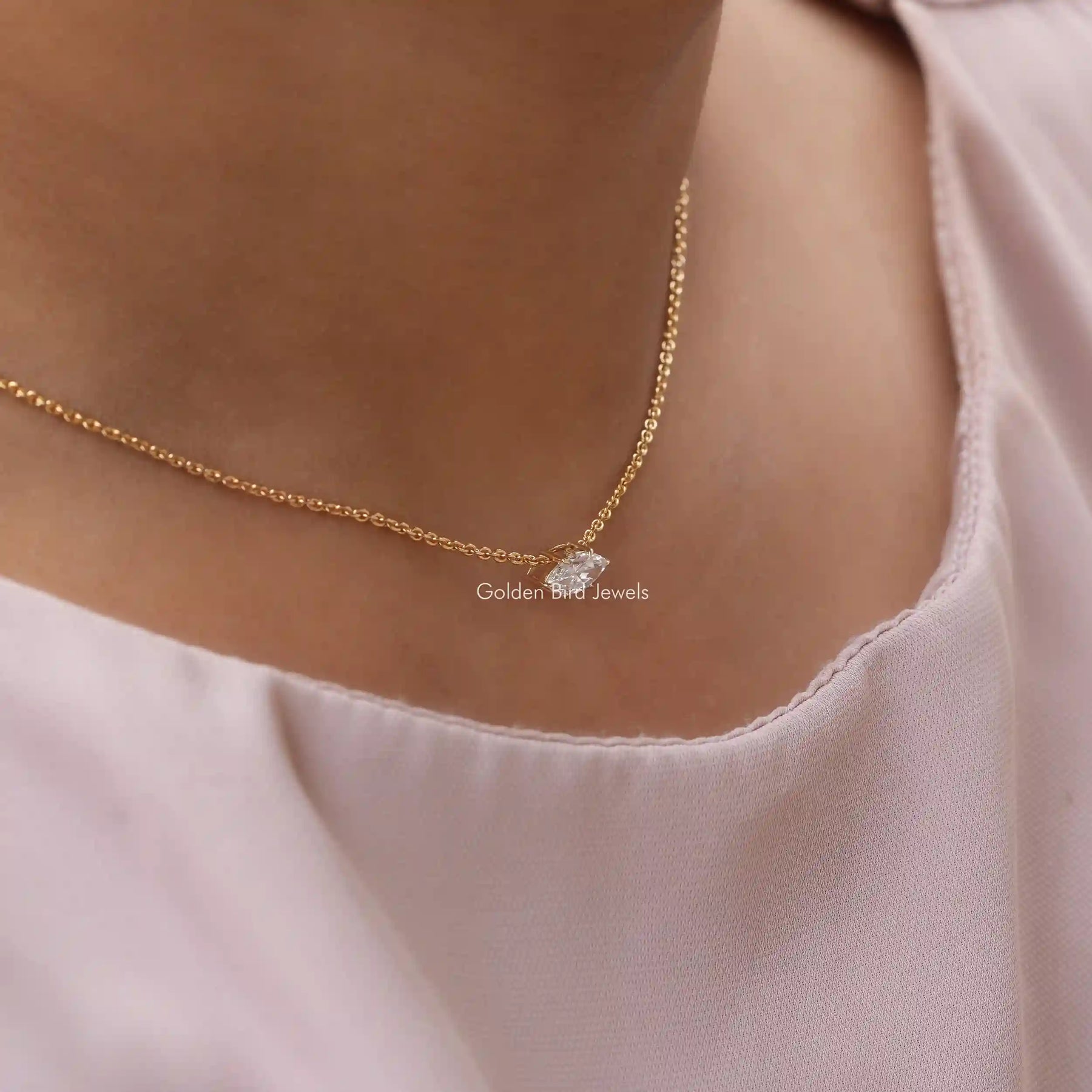 Font view of marquise cut diamond solitaire pendant