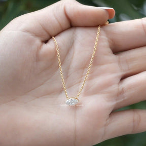 This solitaire pendant made of marquise cut diamond