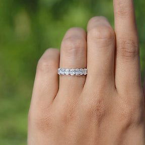 In finger front view of Lab Diamond Seven stone wedding band  