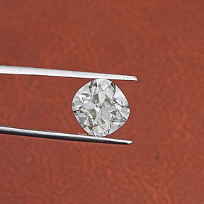 Tweezer hold on Lab Grown Old Mine Cushion Diamond