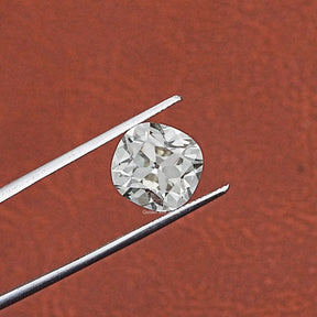 Tweezer hold on Old Mine Cushion Cut Diamond