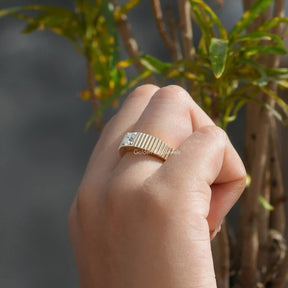 Close-Up View of Round Cut Diamond Solitaire Ring In Yellow Gold