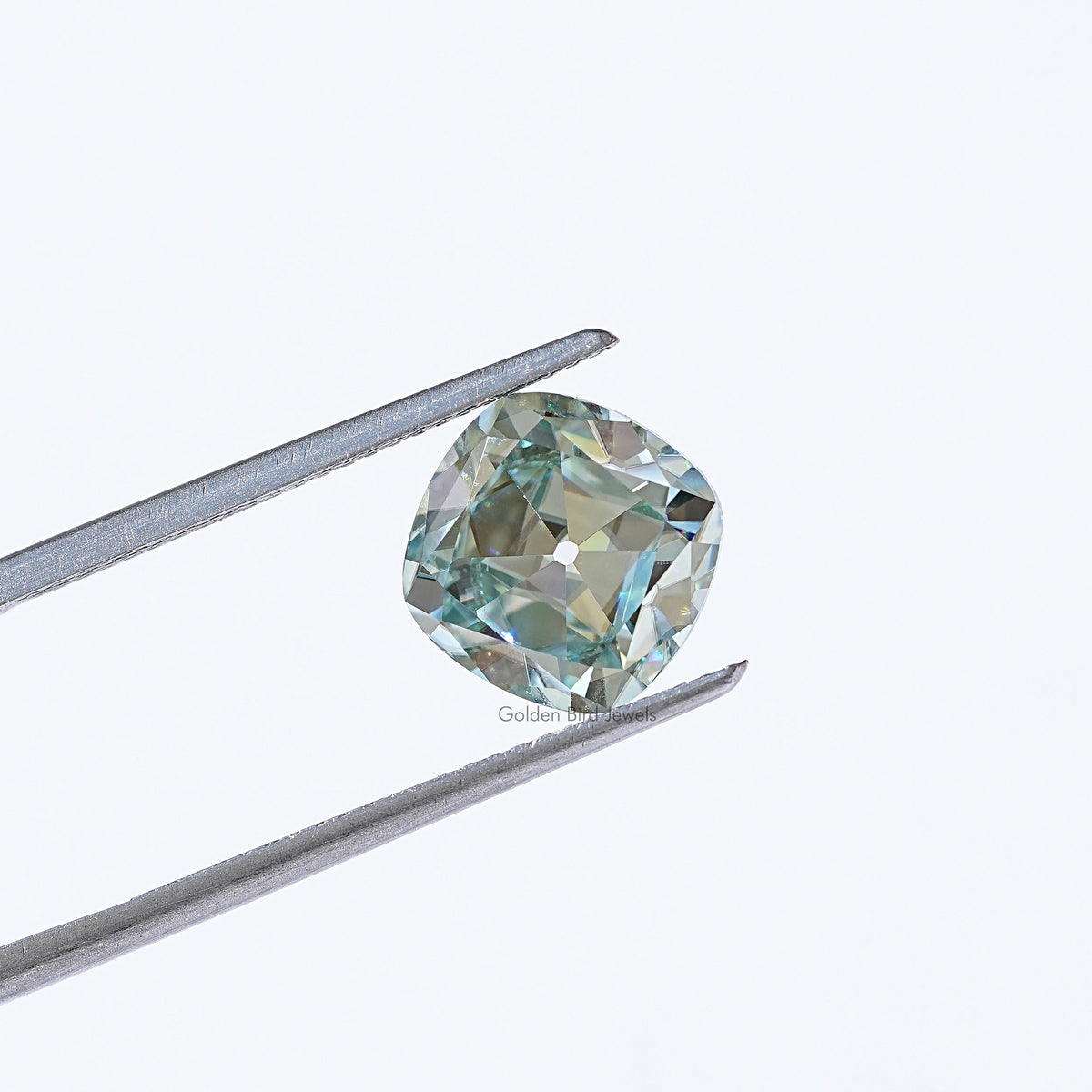 View Of Light Blue Old Mine Cushion Cut Loose