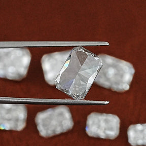 Twijer holding On the Radiant Cut Loose Lab Diamond